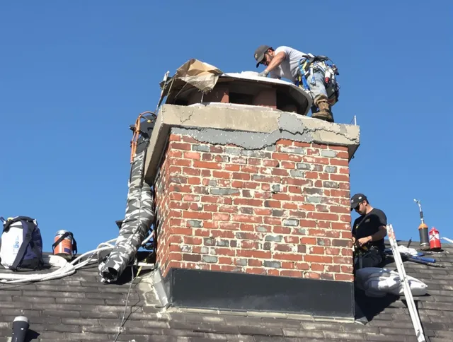 Beaumont Chimney Sweep installing a custom chimney crown in Beaumont, CA
