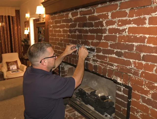 Beaumont Chimney Sweep expert fixing a fireplace in Beaumont, CA